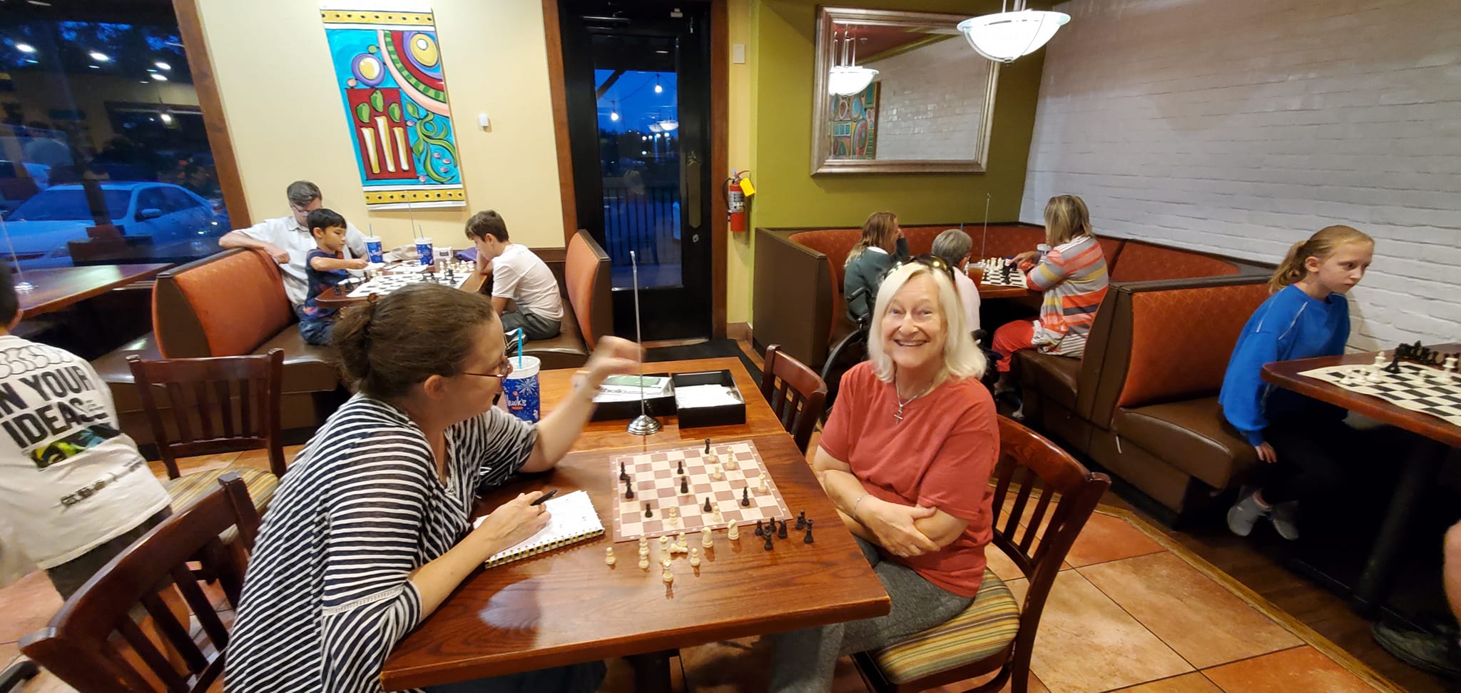 Women playing chess.